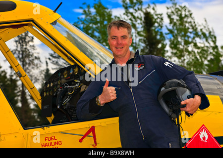 Pilot Guy Cannon with the Air Tractor,AT-802 (modified for bulk fuel hauling - capacity of 4,000 litres),Red Lake,Ontario,Canada Stock Photo