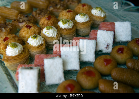 Oriental pastries (with basbosa, shakalama, konafa, kishta, ladida, basima and Balah el Sham) Stock Photo