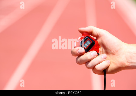 Stopwatch with track background Stock Photo
