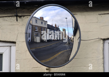 Convex mirror in street, UK Stock Photo