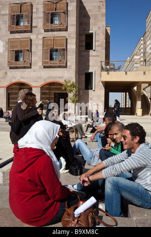 students sitting and talking, new campus, American University in Cairo, Egypt Stock Photo