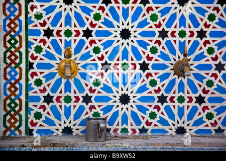 Islamic Pattern Water Faucets inside the Great Mosque in Granada Spain Stock Photo