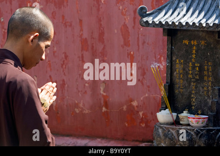 Prayer at the Jade Emperor Pagoda Buddhist temple in Ho Chi Minh City Vietnam Stock Photo