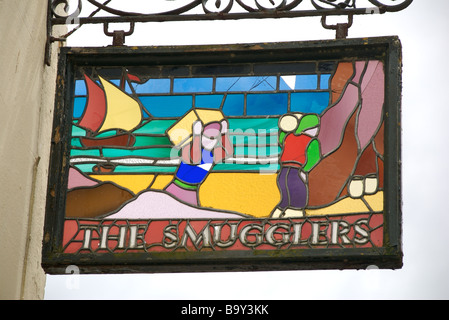 The Smugglers restaurant stained glass sign, Looe, Cornwall, UK Stock Photo