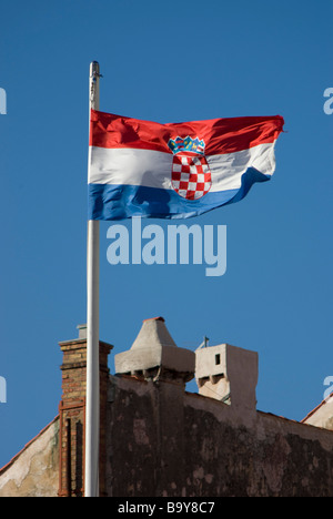 The croatian flag flies over Placa Stradun in Dubrovnik's old town, Croatia Stock Photo