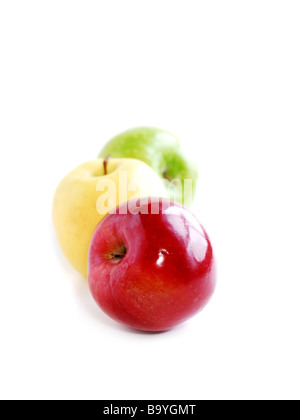 Three apples on white background in perspective green yellow and red