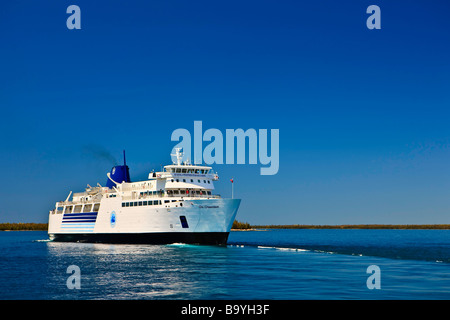 Chi-Cheemaun passenger and vehicle ferry departing Tobermory on the Bruce Peninsula for Manitoulin Island in Lake Huron,Ontario. Stock Photo