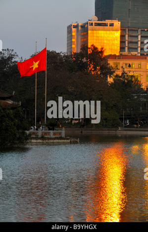 sunset reflection on Hoan Kiem Lake in Hanoi Vietnam Stock Photo