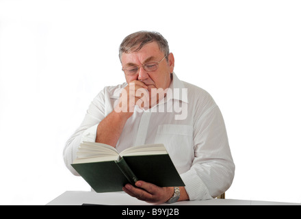 Senior man reading a book Stock Photo