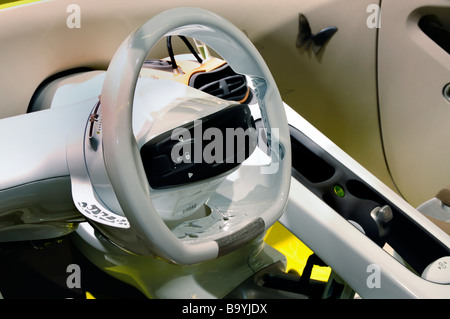 Paris France, detail, steering wheel, 'PSA Peugeot Citroen' French Car Company, 'plug in' 'Salon Durable', Electric Car EV, zero carbon, shopping Stock Photo