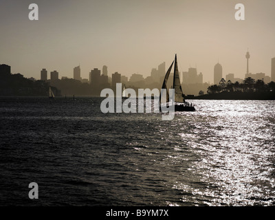 Yacht sailing through Sydney Harbour Stock Photo