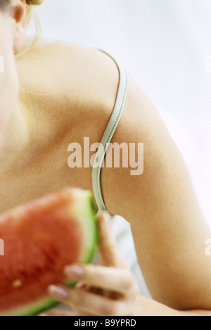 Woman holding slice of watermelon, cropped Stock Photo