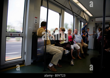 Commuters ride the Metro Rail Transit during the morning rush hour as ...