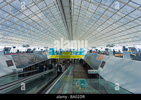 Charles de Gaulle airport terminal 2 F building interior with steel and glass roof Paris France Europe EU Stock Photo