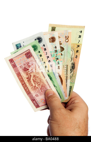 Money male hand holding handful of Chinese currency Stock Photo