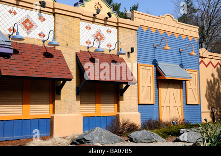 Brightly painted building facade in mock Mexican style Stock Photo