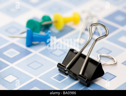 Binder clip and push pins (map pin) Stock Photo