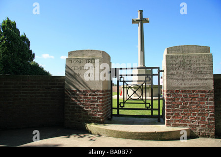 The entrance gate and Cross of Sacrifice to the CWGC Lone Tree Cemetery, Spanbroekmolen), Wijtschate, Belgium. Stock Photo