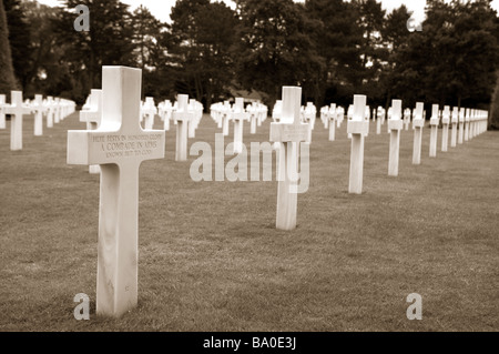 White Crosses stand in remembrance and marking graves of the US servicemen who died in World War II during the D-Day landings. Stock Photo