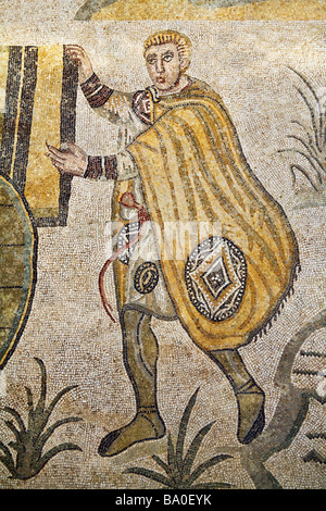 Hunter with cloak mosaic in Sala della Piccola Caccia Room of Small Hunt Villa Romana del Casale 4th century  Piazza Armerina Stock Photo