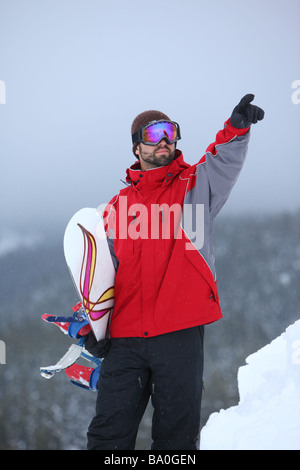 Snowboarder pointing finger Stock Photo