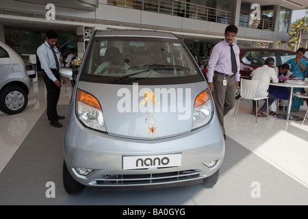 the new Tata car the Nano has been release in the shop of india and indian people seems to be really interresting by this low cost car 2000 Euros than will come soon on the western market Stock Photo