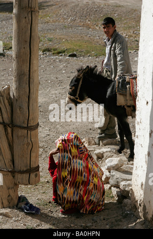 Tajik man and woman wearing traditional dress, Marguzor Lakes, Fan Mountain, Tajikistan, Central Asia Stock Photo