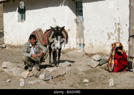 Tajik man and woman wearing traditional dress, Marguzor Lakes, Fan Mountain, Tajikistan, Central Asia Stock Photo