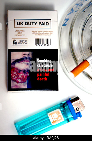 Graphic health warning on UK cigarette packet Stock Photo