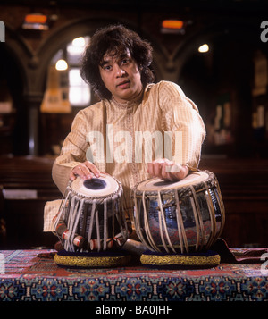 Indian musician Zakir Hussain, playing tabla, in London. Stock Photo