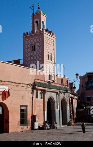 Exterior of a small mosque place of worship for muslim faith on a quiet corner on the place Jemaa El Fna Stock Photo
