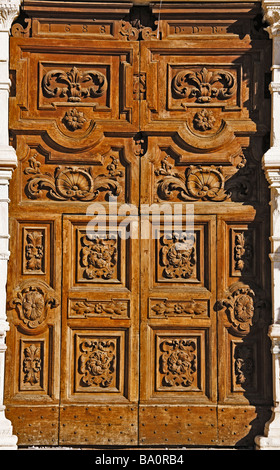Beautifully carved door of the famous and historic Basilica di Santa Maria di Collemaggio in L'Aquila in Abruzzo,Italy Stock Photo