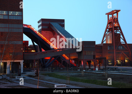 Unesco World heritage site former coal mine Zeche Zollverein. Exhibition halls in the Kohlewaesche. Red lighted escalator, Essen Stock Photo