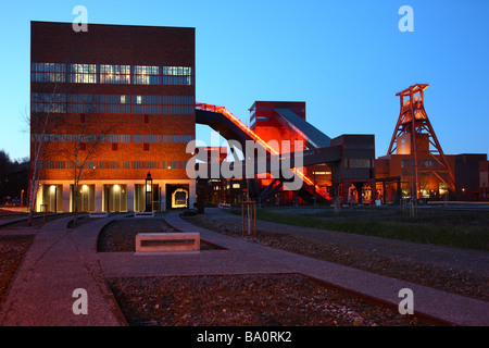 Unesco World heritage site former coal mine Zeche Zollverein. Exhibition halls in the Kohlewaesche. Red lighted escalator, Essen Stock Photo