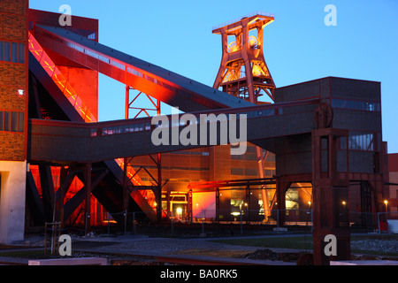 Unesco World heritage site former coal mine Zeche Zollverein. Exhibition halls in the Kohlewaesche. Red lighted escalator, Essen Stock Photo