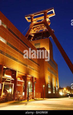 Unesco World heritage site former coal mine Zeche Zollverein. Exhibition halls in the Kohlewaesche. Red lighted escalator, Essen Stock Photo