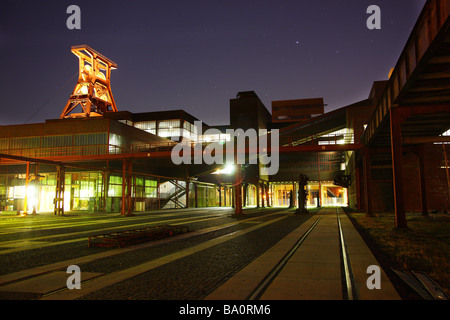 Unesco World heritage site, former coal mine Zeche Zollverein. Exhibition halls in the former Kohlewaesche. Red lighted escalato Stock Photo