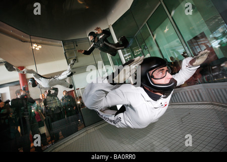 Indoor Skydiving simulator, freefall simulation of a sky dive. An indoor wind tunnel in Bottrop, Germany. Stock Photo