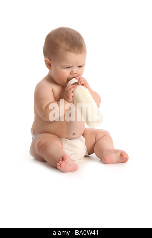 Baby with bottle on white background Stock Photo