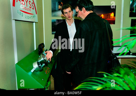 PARIS FRANCE, Visiting Sustainability Trade Show, Business Man,  LED Lighting Exhibit "Abyss Industry Co" Salesman, ecological business, responsible Stock Photo