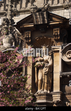 St. Mary's church, High Street, England. Cherry blossom, statue Stock Photo