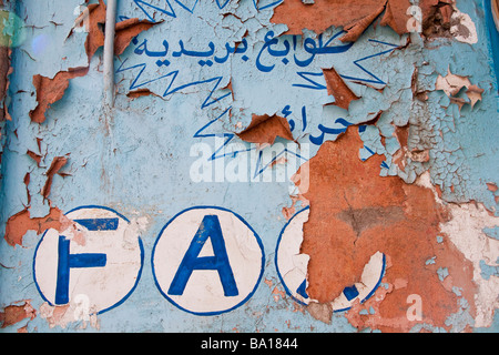 The hand painted crumbling exterior of a public telephone 'teleboutique' in Gueliz, the middle class modern suburb of Marrakech Stock Photo