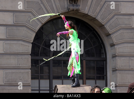 A protestor dancing at the G20 protests in London Stock Photo