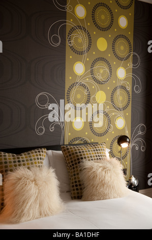 A bedroom in the 5 star Fronlas luxury designer boutique hotel guest house bed and breakfast Llandeilo Carmarthenshire wales UK Stock Photo