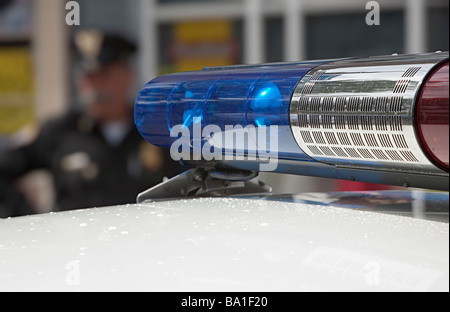 USA style police car blue light on top of car Stock Photo