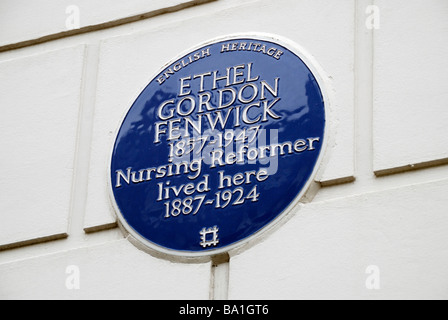 English Heritage blue plaque on exterior of the former home of Ethel Gordon Fenwick at 20 Upper Wimpole Street London W1 Stock Photo