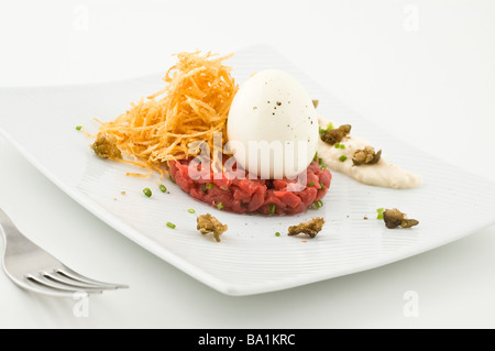 Gourmet dish with egg. Stock Photo