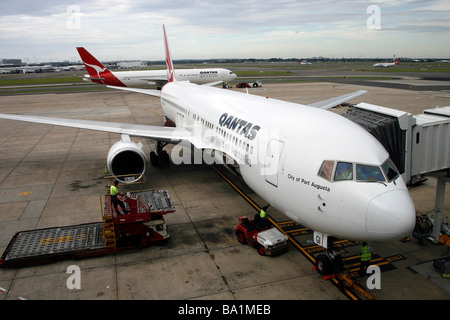 A Qantas Boeing 767-338ER aircraft sits on the tarmac at Sydney Kingsford Smith International Airport Stock Photo