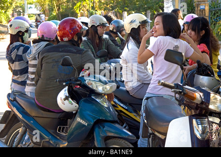 Vietnamese teenagers socialize after school in Hoi An Vietnam Stock Photo