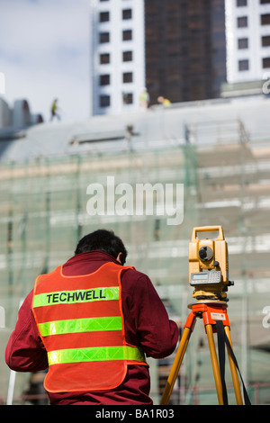 A surveyor working on a construction project in Dubai Stock Photo